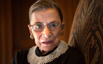 Ruth Bader Ginsburg, celebrating her 20th anniversary as a Supreme Court justice, is photographed in a conference room at the high court in Washington, August 30, 2013. (Nikki Kahn/The Washington Post via Getty Images)
