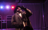 Jewish hip hop singer Nissim Black performs at a Hanukkah festival in Pittsburgh, 2018. (Esther Wayne/SOPA Images/LightRocket via Getty Images via JTA)