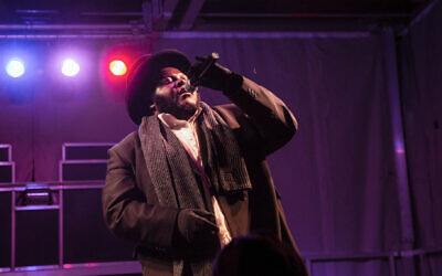 Jewish hip hop singer Nissim Black performs at a Hanukkah festival in Pittsburgh, 2018. (Esther Wayne/SOPA Images/LightRocket via Getty Images via JTA)