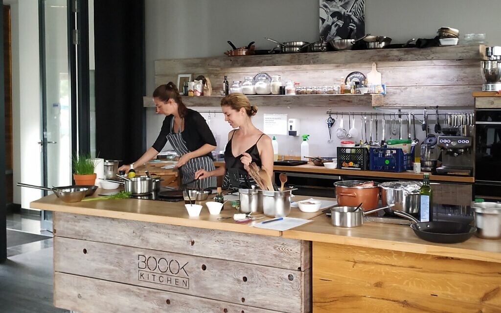 Rachel Raj, center, working in the Boook test kitchen, Budapest, July 2020. (Yaakov Schwartz/ Times of Israel)