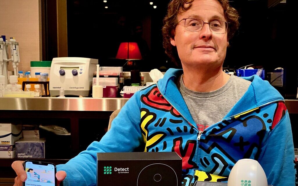 Jonathan Rothberg aboard his superyacht Gene Machine with his home coronavirus test, Detect. (Courtesy)