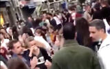 Israelis at a street party on Levinsky Street in South Tel Aviv held in apparent violation of coronavirus restrictions, December 4, 2020. (Screen capture: Twitter)