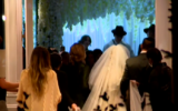 An Orthodox Jewish wedding taking place in contravention to COVID-19 restrictions at the Hilton Chicago Northbrook hotel, December 2, 2020. (Screen capture: CBSN Chicago)