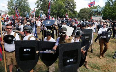 Illustrative: White nationalist demonstrators in Lee Park in Charlottesville, Virginia, August 12, 2017. (AP Photo/Steve Helber) Illustrative: White nationalist demonstrators in Lee Park in Charlottesville, Virginia, August 12, 2017. (AP Photo/Steve Helber)
