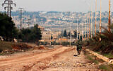 Illustrative: Syrian engineering troops check for mines in the M5 highway in Aleppo, Syria, February 15, 2020. (SANA via AP)