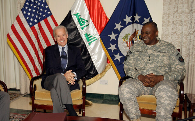 Then US Vice President Joe Biden, left, with then General Lloyd Austin, the top US commander in Iraq, in Baghdad, Iraq, Nov. 29, 2011. (AP Photo/Khalid Mohammed) Then US Vice President Joe Biden, left, with then General Lloyd Austin, the top US commander in Iraq, in Baghdad, Iraq, Nov. 29, 2011. (AP Photo/Khalid Mohammed)