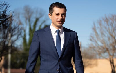 Pete Buttigieg walks to speaks with members of the media in Plains, Georgia, March 1, 2020. (AP Photo/Matt Rourke)