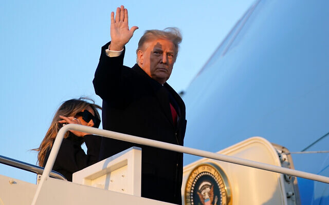 US President Donald Trump boards Air Force One at Andrews Air Force Base, Maryland, December 23, 2020. (AP Photo/Patrick Semansky) US President Donald Trump boards Air Force One at Andrews Air Force Base, Maryland, December 23, 2020. (AP Photo/Patrick Semansky)