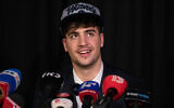Deni Avdija speaks to the media after NBA's Washington Wizards picked him in the NBA draft 2020 in Tel Aviv, Israel, November 19, 2020. (AP Photo/Ariel Schalit)