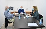 Amnon Straschnov, center, Avraham Ben Shushan, left and Yisraela Friedman meeting to discuss the submarine affair inquiry on December 1, 2020. (Ariel Hermoni, Defense Ministry)