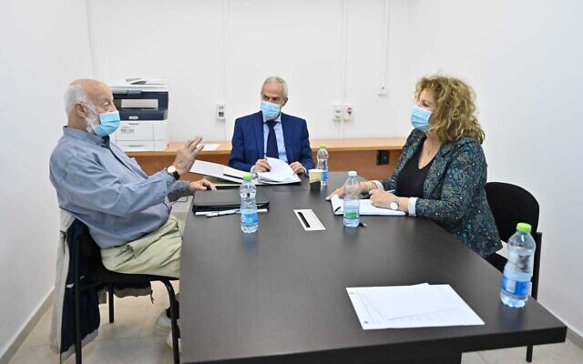 Amnon Straschnov, center, Avraham Ben Shushan, left and Yisraela Friedman meeting to discuss the submarine affair inquiry on December 1, 2020. (Ariel Hermoni, Defense Ministry) Amnon Straschnov, center, Avraham Ben Shushan, left and Yisraela Friedman meeting to discuss the submarine affair inquiry on December 1, 2020. (Ariel Hermoni, Defense Ministry)