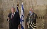 Prime Minister Benjamin Netanyahu, left, and US Ambassador David Friedman at the Western Wall on December 10, 2020, the first night of Hanukkah. Netanyahu hailed the "light" of US President Donald Trump's announcement that Morocco and Israel are to establish full relations, issued hours earlier. (Kobi Gideon/GPO)