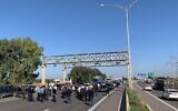 Arab Israeli lawmakers and demonstrators block Route 6 in protest of what they allege is government inaction in the face of violence in Arab cities and towns (Credit: Joint List)