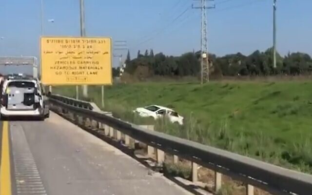 A car is seen by the roadside on Route 6 after it was shot at on December 28, 2020. One man died and another was critically injured in the suspected revenge attack (video screenshot) A car is seen by the roadside on Route 6 after it was shot at on December 28, 2020. One man died and another was critically injured in the suspected revenge attack (video screenshot)