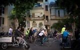 Cyclists demonstrate for more bike lanes in Tel Aviv, December 14, 2018. (Miriam Alster/Flash90)