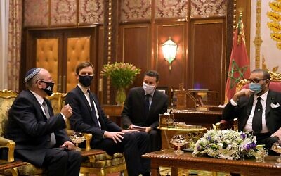 Israeli National Security Adviser Meir Ben-Shabbat (1st from left), Senior White House Adviser Jared Kushner (2nd left) and Moroccan King Mohammed VI (1st from right) at the royal palace in Rabat, December 22, 2020 (Amos Ben Gershom/GPO)