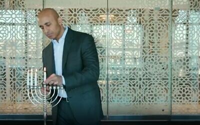 UAE Ambassador to the US Yousef al-Otaiba joins the Israeli embassy's virtual Hanukkah lighting, December 12, 2020. (screencapture via Twitter)