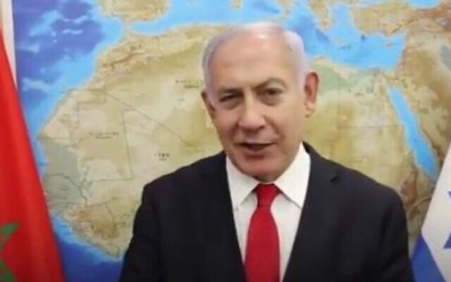 Prime Minister Benjamin Netanyahu in a video produced by his office in which he welcomes the normalization deal between Israel and Morocco. (Twitter screen capture) Prime Minister Benjamin Netanyahu in a video produced by his office in which he welcomes the normalization deal between Israel and Morocco. (Twitter screen capture)