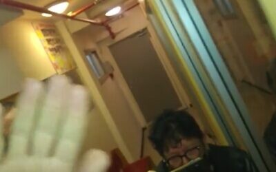 Sheffi Paz as she and another activist broke into a preschool in south Tel Aviv, December 15, 2020 (Screen grab)