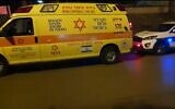 Scene outside an apartment where a woman was stabbed to death in Rehovot, December 11, 2020 (Screen grab/Channel 13)