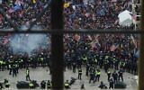 Police hold back supporters of US President Donald Trump as they gather outside the US Capitol's Rotunda on January 6, 2021, in Washington, DC. (Olivier Douliery/AFP)