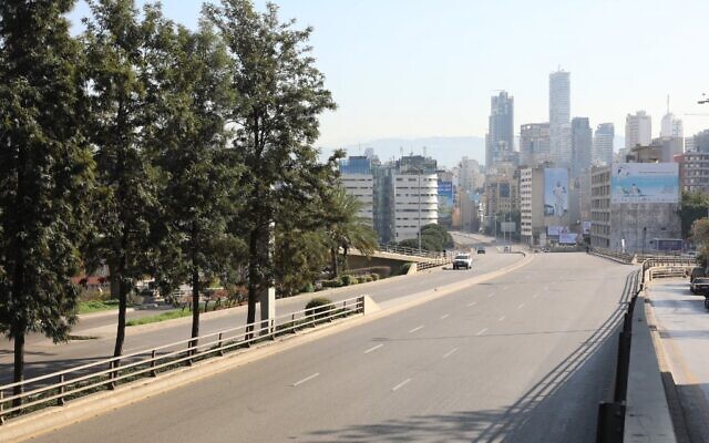 A picture taken on January 10, 2021, shows an empty main road in central Beirut after the country went into a three-week lockdown earlier this week in a bid to stem the spread of the novel coronavirus in Lebanon. (ANWAR AMRO / AFP) A picture taken on January 10, 2021, shows an empty main road in central Beirut after the country went into a three-week lockdown earlier this week in a bid to stem the spread of the novel coronavirus in Lebanon. (ANWAR AMRO / AFP)