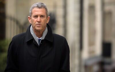 French-Israeli diamond magnate Beny Steinmetz returns to Geneva's courthouse during his trial over allegations of corruption linked to mining deals in Guinea, on January 11, 2021. (Fabrice Coffrini/AFP)