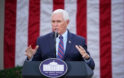 In this file photo taken on November 13, 2020 US Vice President Mike Pence delivers an update on "Operation Warp Speed" in the Rose Garden of the White House in Washington, DC. - US Vice President Mike Pence on January 12, 2021, told House leaders he does not support invoking the 25th Amendment process to remove Donald Trump, all but guaranteeing an imminent impeachment vote against the president. (Photo by MANDEL NGAN / AFP)