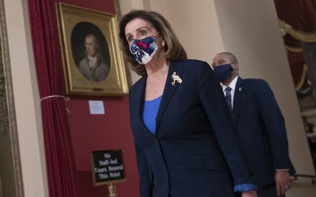 US Speaker of the House Nancy Pelosi walks to the House chamber to consider the impeachment of US President Donald Trump for high crimes and misdemeanors on January 12, 2021 in Washington, DC (ANDREW CABALLERO-REYNOLDS / AFP)