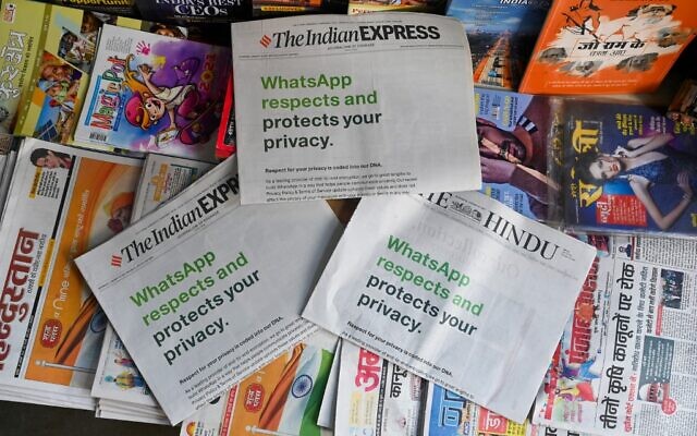 An advertisement from WhatsApp is seen in a newspaper at a stall in New Delhi on January 13, 2021. (Sajjad Hussain/AFP) An advertisement from WhatsApp is seen in a newspaper at a stall in New Delhi on January 13, 2021. (Sajjad Hussain/AFP)