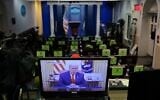 An image on a monitor shows US President Donald Trump speaking during in a video posted on the White House Twitter feed, in the empty Brady Briefing Room of the White House in Washington, DC, on January 13, 2021 ( MANDEL NGAN / AFP)