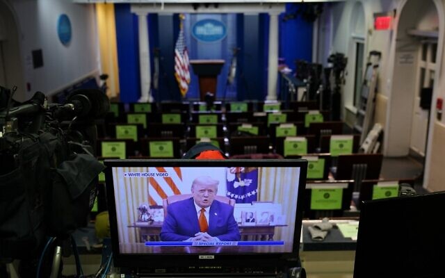 An image on a monitor shows US President Donald Trump speaking during in a video posted on the White House Twitter feed, in the empty Brady Briefing Room of the White House in Washington, DC, on January 13, 2021 ( MANDEL NGAN / AFP) An image on a monitor shows US President Donald Trump speaking during in a video posted on the White House Twitter feed, in the empty Brady Briefing Room of the White House in Washington, DC, on January 13, 2021 ( MANDEL NGAN / AFP)