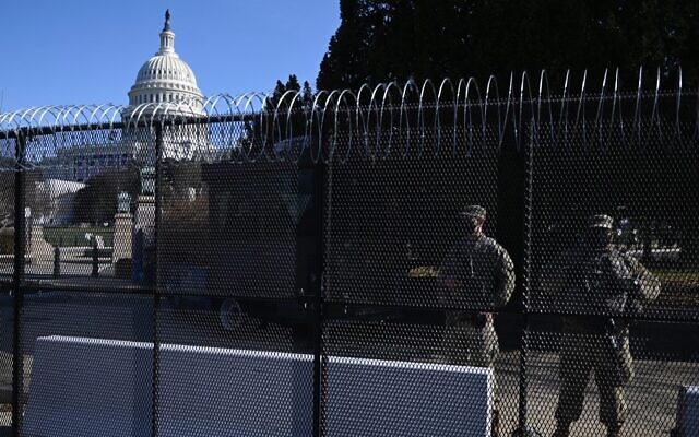 Barbed wire is installed on the top of a security fence surrounding the US Capitol in Washington, January 14, 2021, ahead of next week's presidential inauguration of Joe Biden. (Andrew Caballero-Reynolds/AFP) Barbed wire is installed on the top of a security fence surrounding the US Capitol in Washington, January 14, 2021, ahead of next week's presidential inauguration of Joe Biden. (Andrew Caballero-Reynolds/AFP)