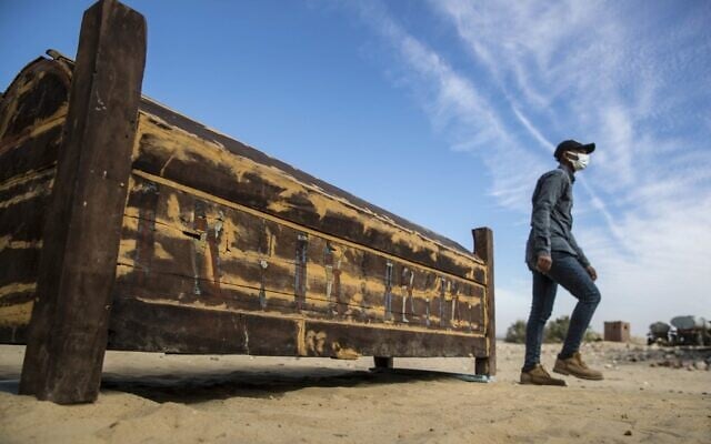 An adorned wooden sarcophagus is displayed during the official announcement of the discovery by an Egyptian archaeological mission of a new trove of treasures at Egypt's Saqqara necropolis south of Cairo, on January 17, 2021. (Khaled DESOUKI / AFP)