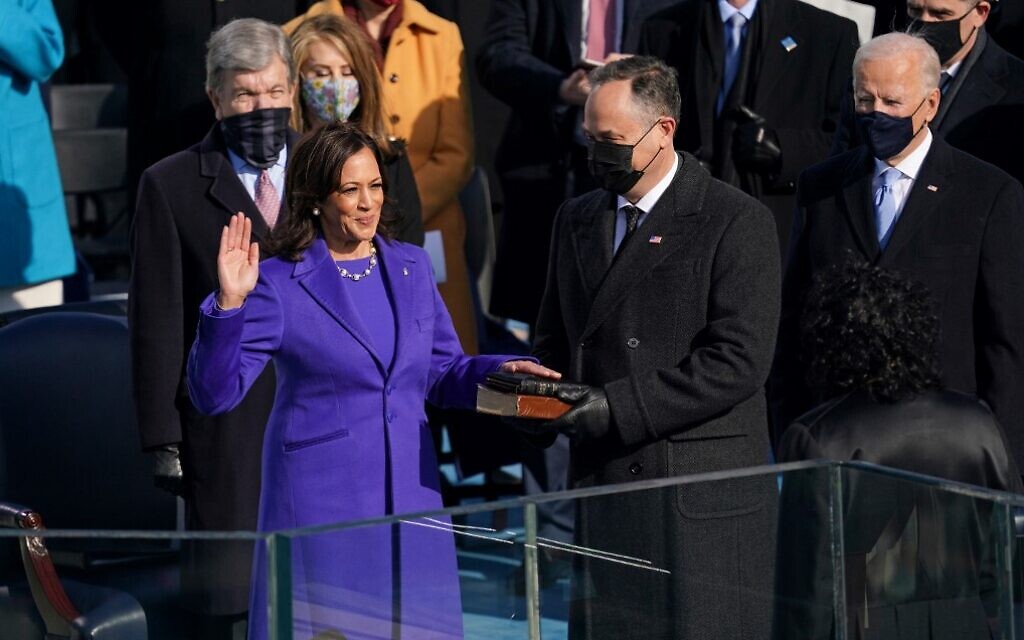 Kamala Harris (L), with her husband  Doug Emhoff (C), is sworn in as US vice president by Justice Sonia Sotomayor (R) on January 20, 2021, at the US Capitol in Washington. (Andrew Harnik and Erin Schaff/Pool/AFP)
