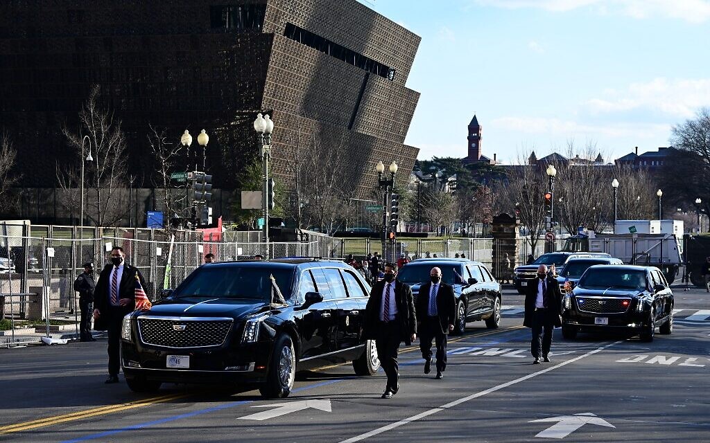 The motorcade with US President Joe Biden and US Vice President Kamala Harris heads to the White House past the National Museum of African American History and Culture in Washington, DC, on January 20, 2021. (JIM WATSON / AFP)