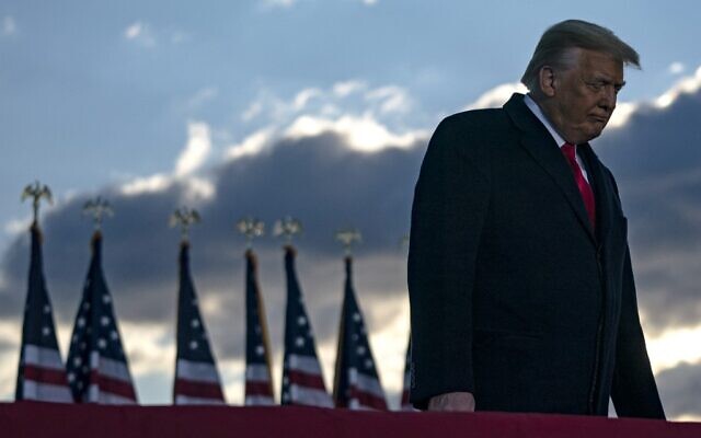 Outgoing US President Donald Trump addresses guests at Joint Base Andrews in Maryland on January 20, 2021. (ALEX EDELMAN/AFP) Outgoing US President Donald Trump addresses guests at Joint Base Andrews in Maryland on January 20, 2021. (ALEX EDELMAN/AFP)