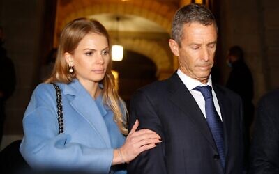 Israeli diamond magnate Beny Steinmetz  is comforted by lawyer Camille Haab after his conviction for corruption linked to mining deals in Guinea, in Geneva on January 22, 2021. Steinmetz was sentenced to five years in jail. (STEFAN WERMUTH / AFP)