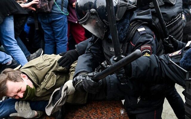 Protesters clash with riot police during a rally in support of jailed opposition leader Alexei Navalny in downtown Moscow on January 23, 2021. (Kirill Kudryavtsev/AFP)