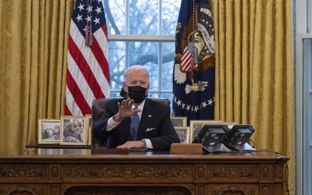 US President Joe Biden in the Oval Office of the White House on January 25, 2021. (Jim Watson/AFP) US President Joe Biden in the Oval Office of the White House on January 25, 2021. (Jim Watson/AFP)