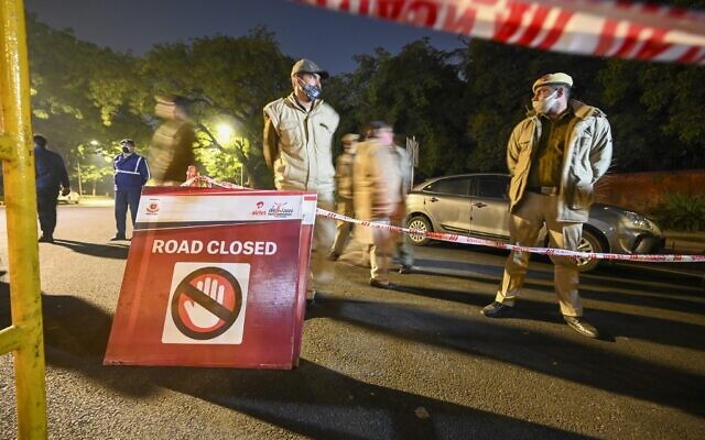 Police close off a street after an explosion near the Israeli embassy in New Delhi on January 29, 2021. (Sajjad HUSSAIN / AFP) Police close off a street after an explosion near the Israeli embassy in New Delhi on January 29, 2021. (Sajjad HUSSAIN / AFP)