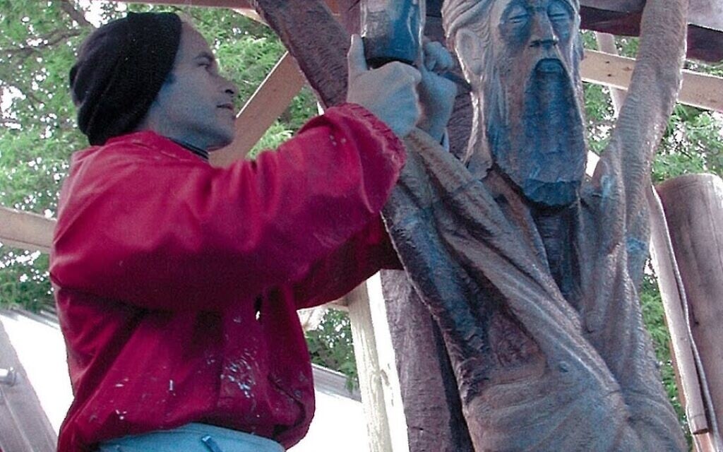 Raphael Gribetz at work on a crucifix for a local Catholic parish in Presque Isle, Maine. (Courtesy of Gribetz/ via JTA)