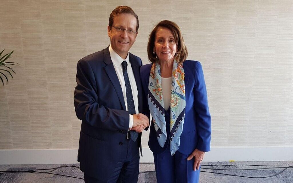 Then-opposition leader Isaac Herzog greets Nancy Pelosi in Tel Aviv on March 26, 2018. (Isaac Herzog's Twitter feed via JTA) Then-opposition leader Isaac Herzog greets Nancy Pelosi in Tel Aviv on March 26, 2018. (Isaac Herzog's Twitter feed via JTA)