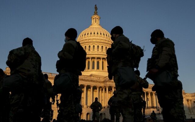 Members of the National Guard gather outside the US Capitol on January 13, 2021 in Washington, DC. (Stefani Reynolds/Getty Images/AFP)
