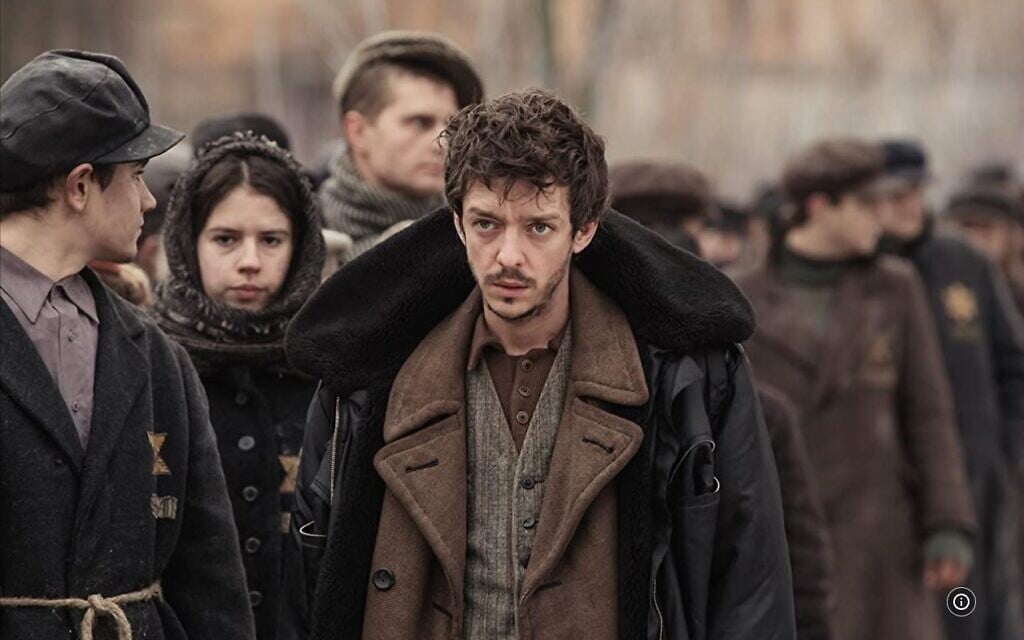 Nahuel Perez Biscayart portrays a Jewish inmate at a concentration camp during filming in Belarus of the film 'Persian Lessons' in 2019. (Courtesy of HyperFilms/ via JTA)