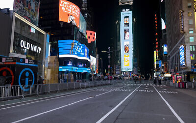 Seventh Avenue is mostly empty during what would normally be a Times Square packed with people, December 31, 2020, in New York, as celebrations have been truncated this New Year's Eve due to the ongoing pandemic. (AP Photo/Craig Ruttle)
