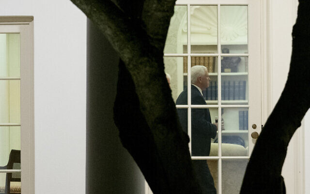 US Vice President Mike Pence walks through the Oval Office, Monday, Jan. 4, 2021 (AP Photo/Andrew Harnik) US Vice President Mike Pence walks through the Oval Office, Monday, Jan. 4, 2021 (AP Photo/Andrew Harnik)
