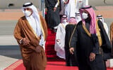 Saudi Arabia's Crown Prince Mohammed bin Salman, right, welcomes Qatar's Emir Sheikh Tamim bin Hamad al-Thani upon his arrival to attend the Gulf Cooperation Council's 41st Summit in Al-Ula, Saudi Arabia, January 5, 2021. (Saudi Royal Court via AP)