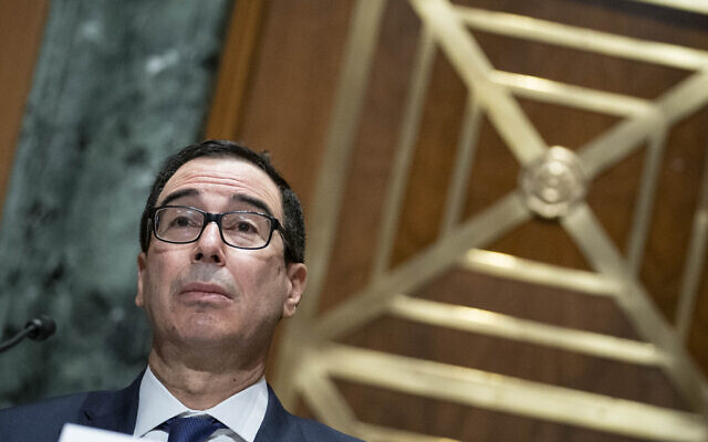 US Treasury Secretary Steven Mnuchin testifies before a Congressional Oversight Commission hearing on Capitol Hill in Washington, December 10, 2020. (Sarah Silbiger/The Washington Post via AP, Pool, File) US Treasury Secretary Steven Mnuchin testifies before a Congressional Oversight Commission hearing on Capitol Hill in Washington, December 10, 2020. (Sarah Silbiger/The Washington Post via AP, Pool, File)