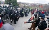 US Capitol Police push back demonstrators who were trying to enter the US Capitol on January 6, 2021, in Washington. (AP Photo/Jose Luis Magana)